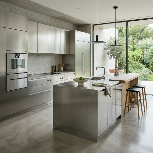 Premium modular kitchen with island layout, veneer shutters and soft-close hardware in Hyderabad villa